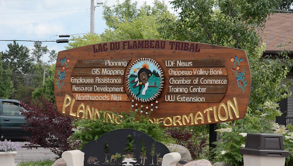 sign listing municipal buildings, downtown Lac du Flambeau