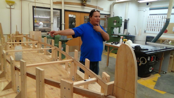 Wayne demonstrates traditional method of deciding the width of a canoe