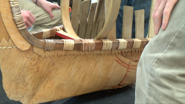 final ribs set in place near stern of canoe