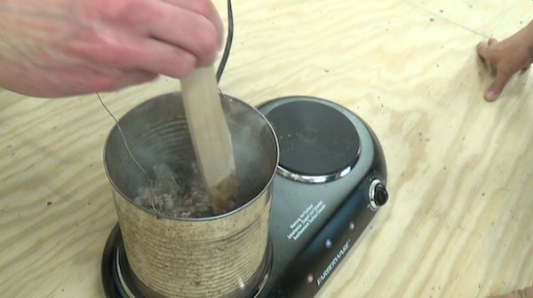 pitch cubes are melted over heated in a coffee can