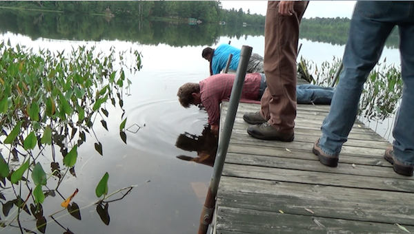 gunwale pieces are retrieved from lake