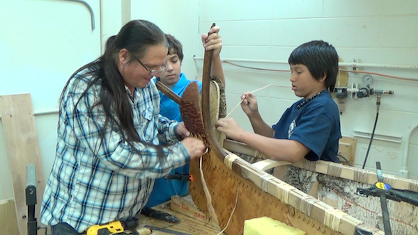 Wayne and two students working on stern